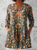 Celine | Longue blouse à col en V