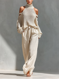 Thalia - Completo maglia dolcevita a spalle scoperte e pantaloni ampi beige