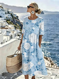 Skye™ | Élégante robe midi florale de la côte