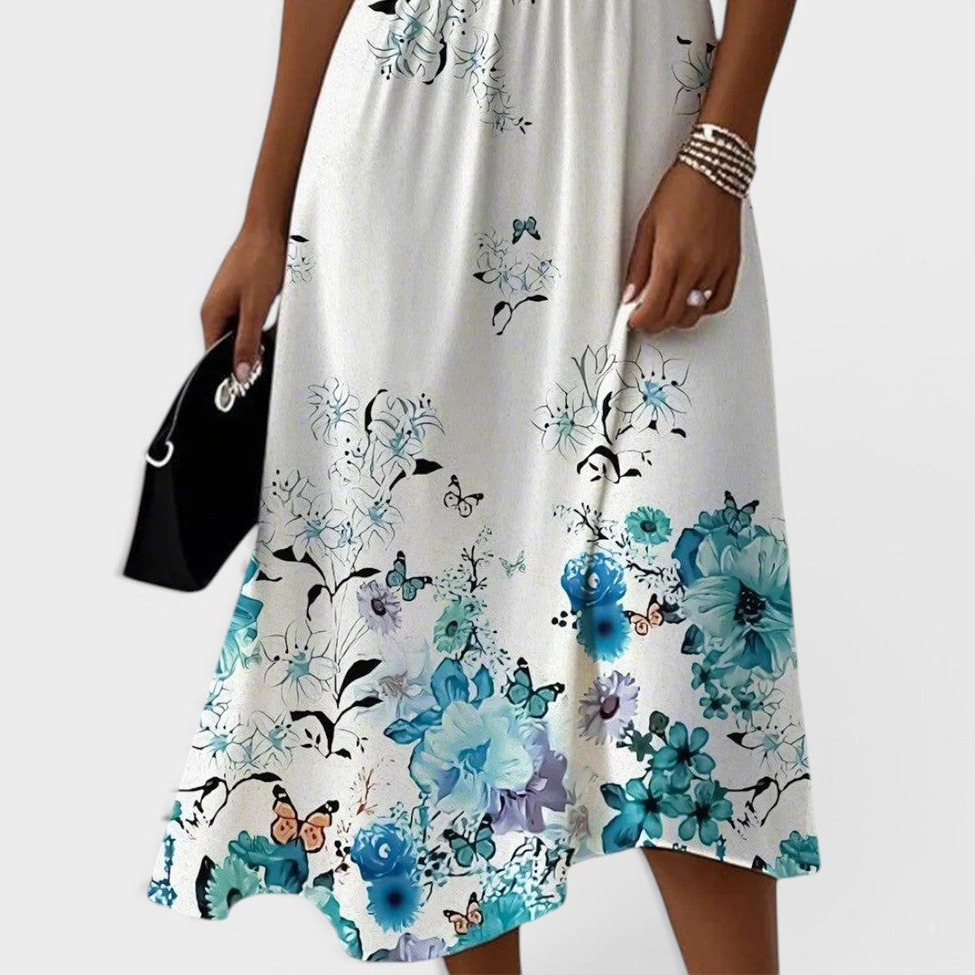 Seraphina | Robe midi bleue à fleurs avec manches volantées